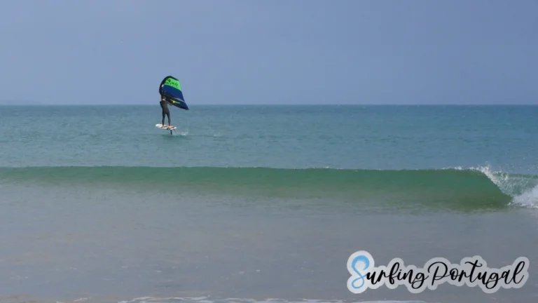 Hand wing foil surfer at Lagos beach (Meia Praia)
