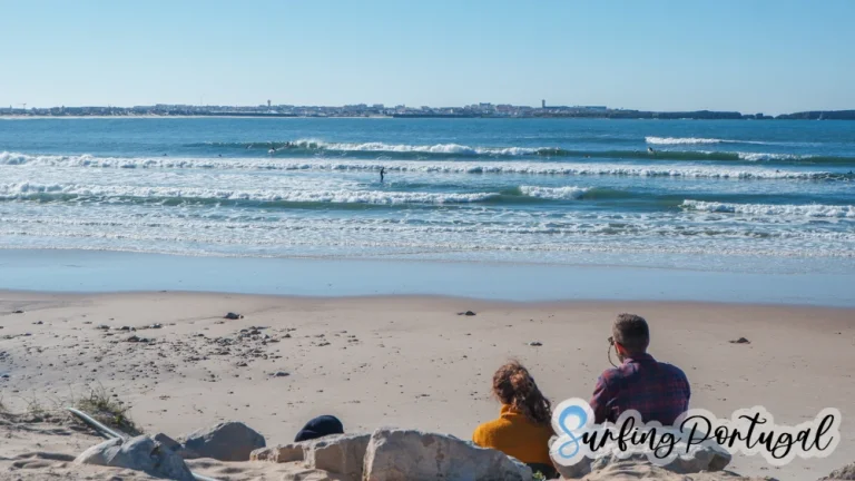 People watching surfers at Baleal Cantinho