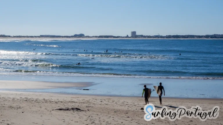 Surfers walking towards the water at Baleal Cantinho