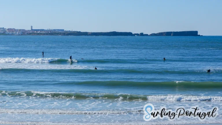 Surfers in the water at Baleal Cantinho