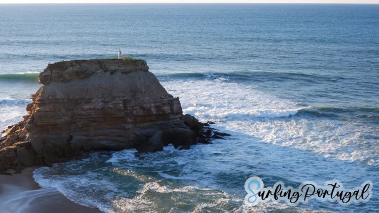Rock with a virgin on top, at Porto Novo surf spot
