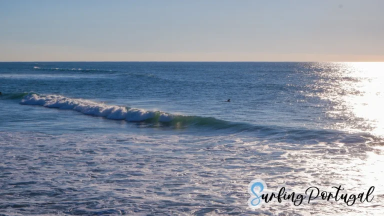 Surfers in the water at Areia Branca surf spot