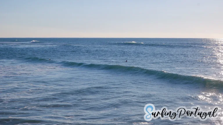 Surfers in the water at Areia Branca surf spot