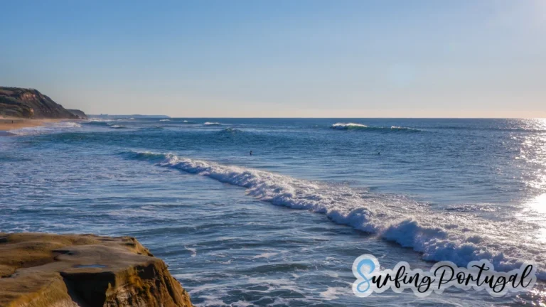 Surfers in the water at Areia Branca surf spot