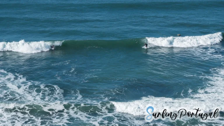 Surfer on a wave at Praia de São Sebastião, Ericeira