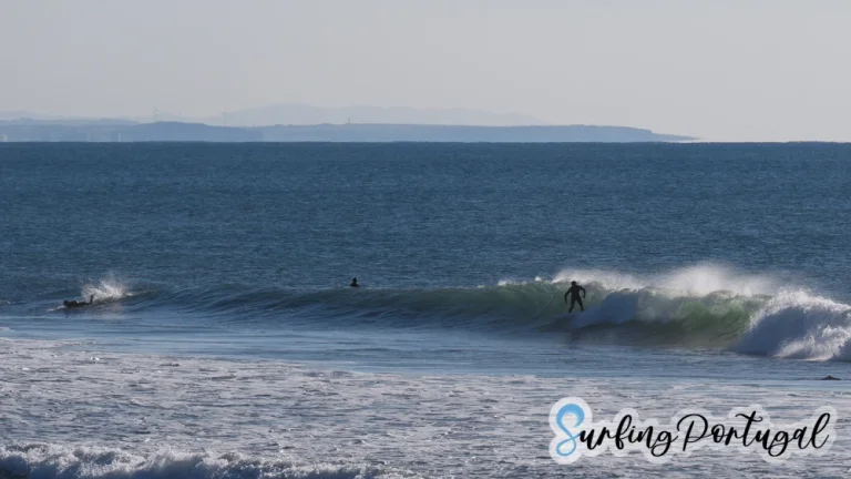 Surfer on a wave at Supertubos