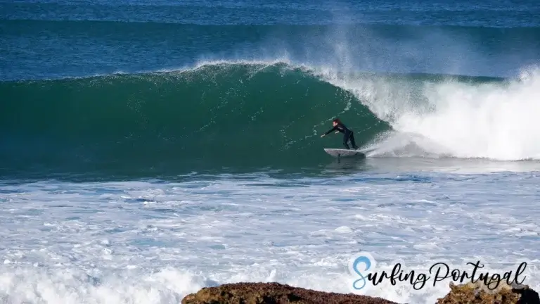 Surfer at Coxos wave, Ericeira