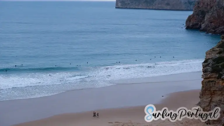 Surfers in the water at Beliche beach