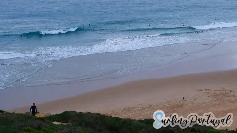 Surfers in the water at Beliche beach